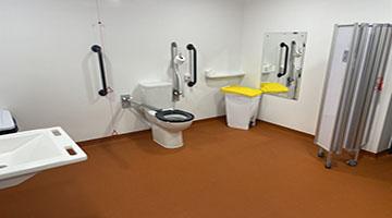 Changing Places toilet, changing station, bin and privacy divider