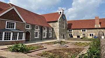 Stone building with red roof
