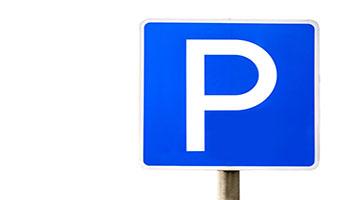 White letter P on blue sign