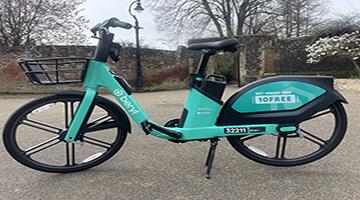 Green electric bike parked