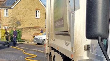 Bin lorry in road